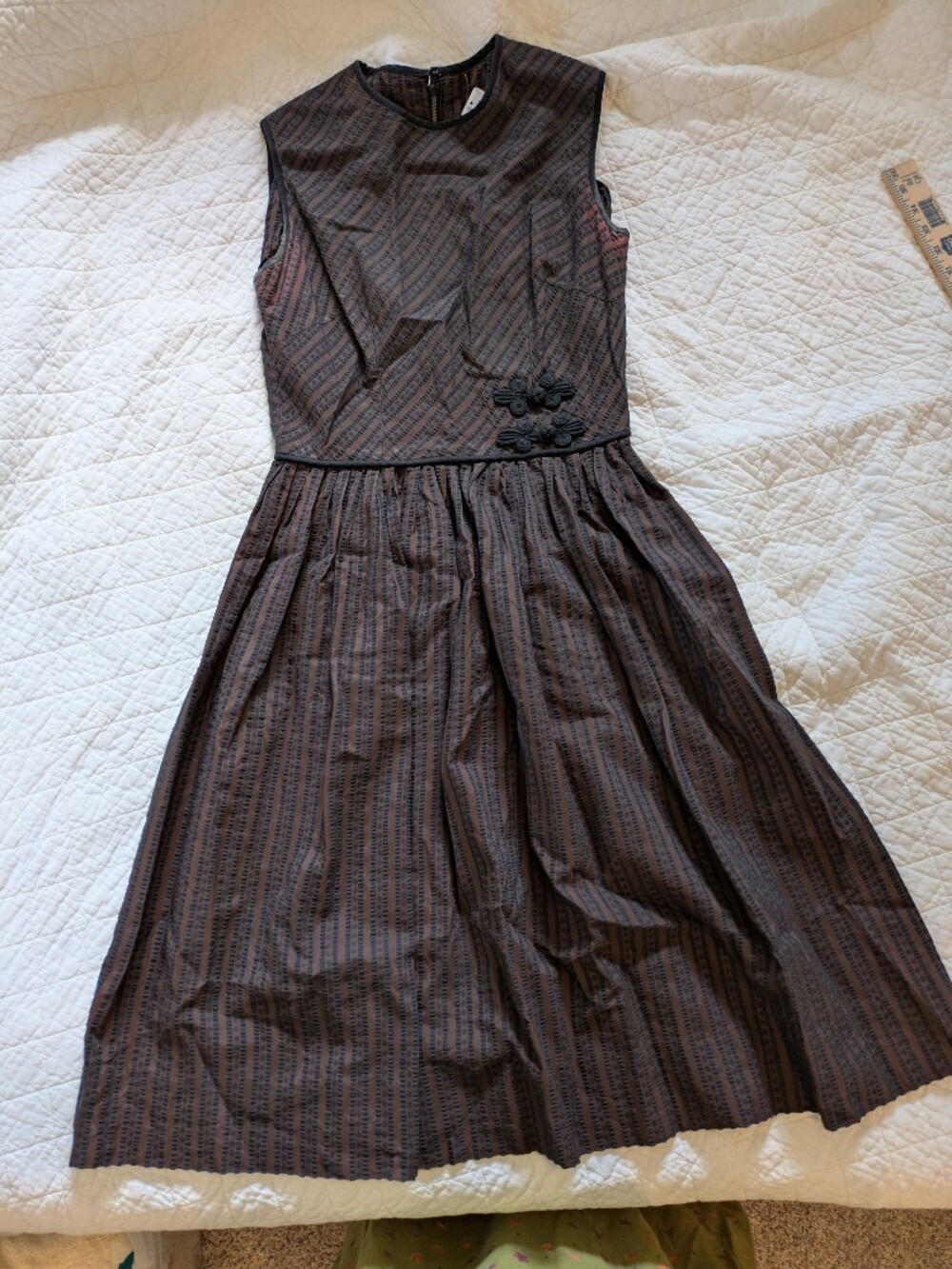 Vintage Brown and Black Striped Dress with Decorative Closure